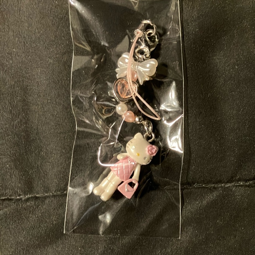 Hello Kitty Smartphone Charm Blind Box (Naughty and Nice Series)